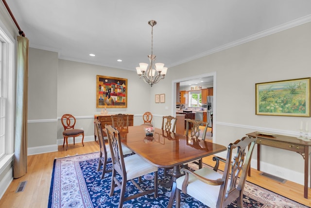 14 Withe Pass, Burlington, CT 06013 - dining space with light wood-style floors, a chandelier, crown molding, recessed lighting, and baseboards