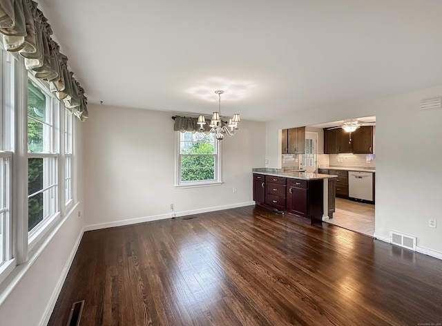 57 Fenway Dr, Hamden, CT 06517 - kitchen with dishwashing machine, a chandelier, light countertops, dark wood-style floors, and dark brown cabinets