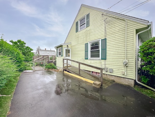 57 Fenway Dr, Hamden, CT 06517 - view of side of home with a gate
