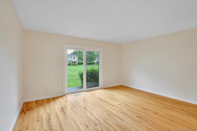 165 Hampton Ct Unit 165, Newington, CT 06111 - spare room featuring light wood-style flooring and baseboards