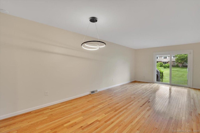 165 Hampton Ct Unit 165, Newington, CT 06111 - empty room featuring hardwood / wood-style floors and baseboards
