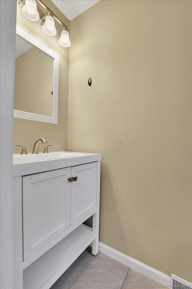 165 Hampton Ct Unit 165, Newington, CT 06111 - bathroom with vanity, baseboards, and tile patterned floors