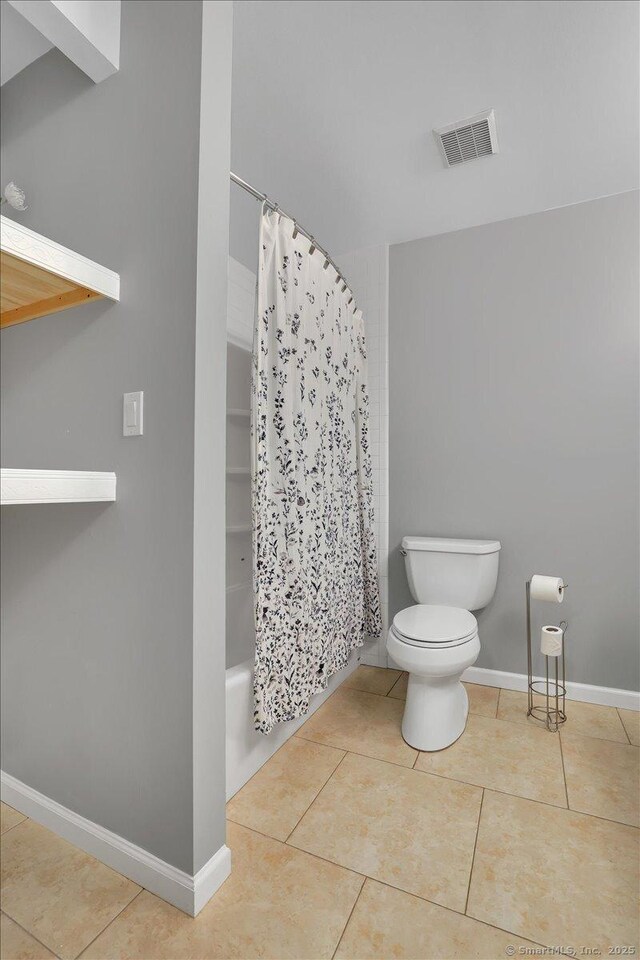 165 Hampton Ct Unit 165, Newington, CT 06111 - bathroom featuring toilet, tile patterned flooring, shower / tub combo, and baseboards