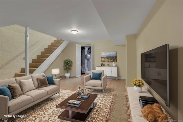 165 Hampton Ct Unit 165, Newington, CT 06111 - living room featuring stairway, wood finished floors, and baseboards