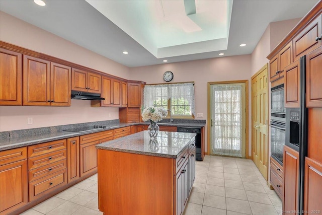 503 Dzen Way Unit 503, South Windsor, CT 06074 - kitchen with black appliances, under cabinet range hood, brown cabinetry, light tile patterned floors, and recessed lighting