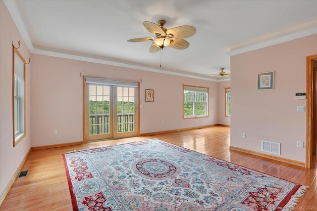 503 Dzen Way Unit 503, South Windsor, CT 06074 - spare room featuring healthy amount of natural light, light wood-style floors, ceiling fan, and ornamental molding