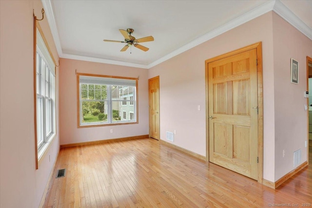 503 Dzen Way Unit 503, South Windsor, CT 06074 - spare room with light wood-type flooring, ceiling fan, and crown molding