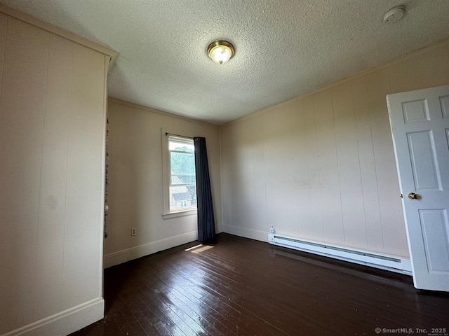 220 Kensington Ave, New Britain, CT 06051 - empty room featuring a baseboard heating unit, hardwood / wood-style flooring, a smoke detector, baseboards, and a textured ceiling
