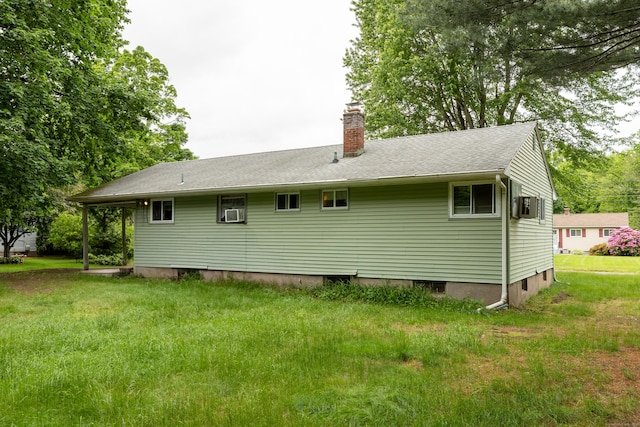 165 Scantic Meadow Rd, South Windsor, CT 06074 - rear view of property featuring a chimney, a lawn, and cooling unit