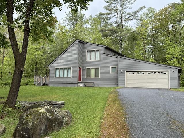 53 Bentley Cir, Goshen, CT 06756 - view of front of home with driveway, a garage, and a front lawn