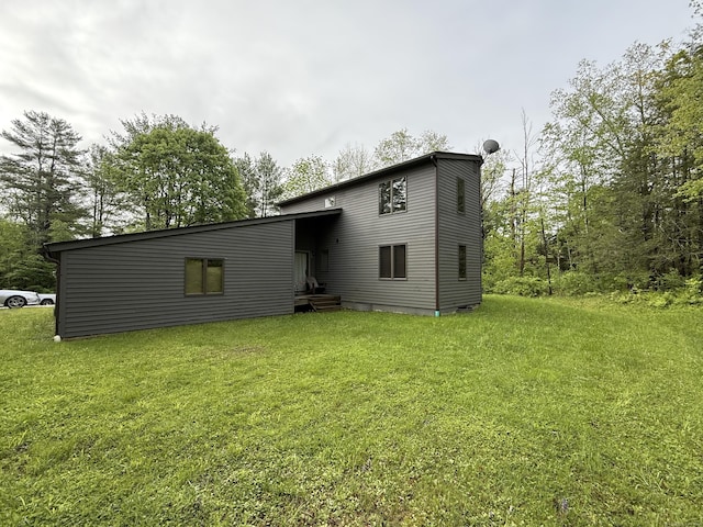 53 Bentley Cir, Goshen, CT 06756 - back of property with a lawn
