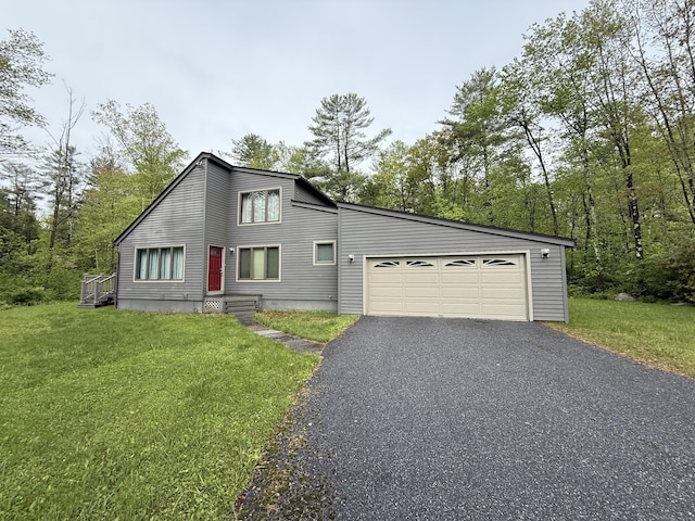 53 Bentley Cir, Goshen, CT 06756 - view of front of property featuring asphalt driveway, a front lawn, and an attached garage