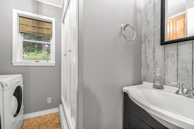 28 Blakeman Dr, Monroe, CT 06468 - bathroom with washing machine and dryer, vanity, baseboards, and baseboard heating