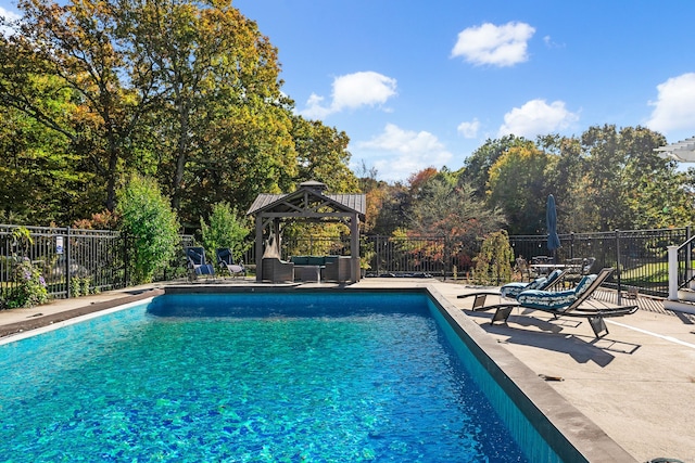 11 Pequot Ln, Hopkinton, Rhode Island, RI 02804 - view of swimming pool featuring a gazebo, outdoor lounge area, a patio area, and view of scattered trees