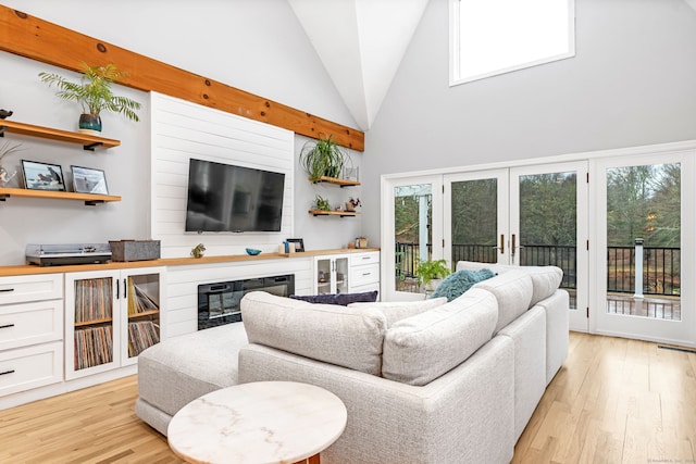 11 Pequot Ln, Hopkinton, Rhode Island, RI 02804 - living area featuring light wood finished floors and high vaulted ceiling
