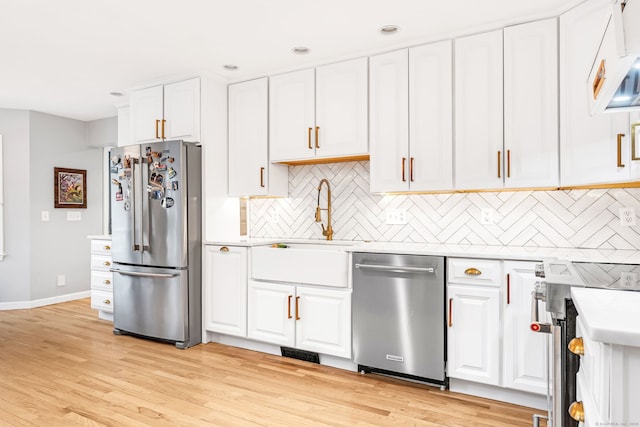 11 Pequot Ln, Hopkinton, Rhode Island, RI 02804 - kitchen featuring appliances with stainless steel finishes, baseboards, white cabinetry, light countertops, and recessed lighting