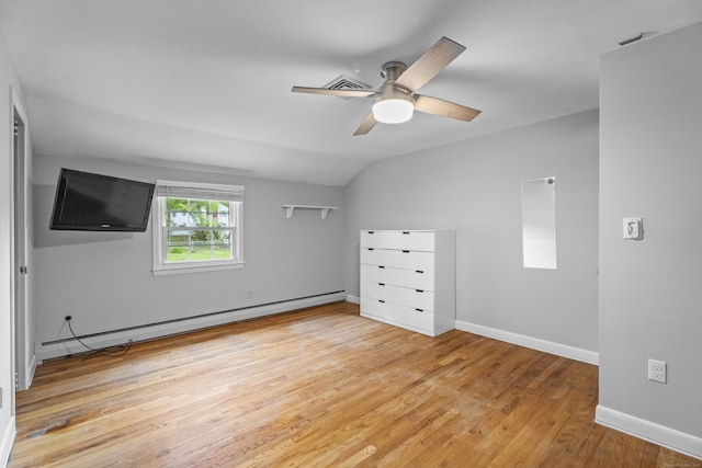38 Rossie St, Stonington, CT 06355 - unfurnished bedroom featuring a baseboard heating unit, light wood-style flooring, lofted ceiling, and ceiling fan