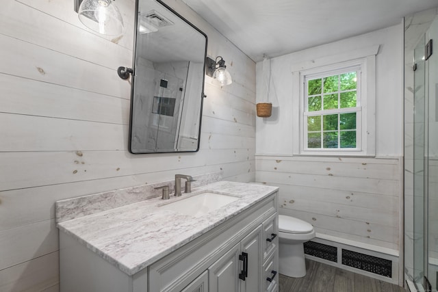 38 Rossie St, Stonington, CT 06355 - full bath featuring vanity, a stall shower, wood walls, and wood finished floors