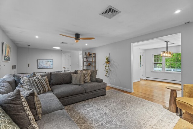 38 Rossie St, Stonington, CT 06355 - living room featuring a baseboard heating unit, wood finished floors, recessed lighting, and a ceiling fan