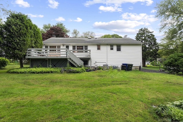 38 Rossie St, Stonington, CT 06355 - back of property with a deck and a yard