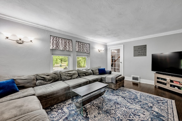 242 Park Ave, Bloomfield, CT 06002 - living room with wood finished floors, ornamental molding, a textured ceiling, and baseboards