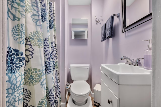 242 Park Ave, Bloomfield, CT 06002 - bathroom featuring toilet, vanity, and a shower with shower curtain