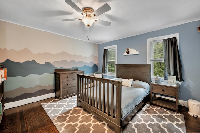 242 Park Ave, Bloomfield, CT 06002 - bedroom featuring wood finished floors, ornamental molding, baseboards, and ceiling fan
