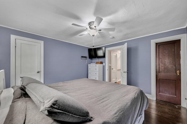 242 Park Ave, Bloomfield, CT 06002 - bedroom featuring dark wood finished floors, baseboards, and a ceiling fan