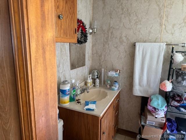 21 Clinic Rd, Pomfret, CT 06230 - bathroom with vanity and tile patterned floors