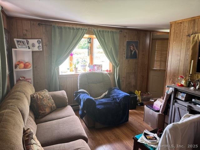 21 Clinic Rd, Pomfret, CT 06230 - living room with wood finished floors and wood walls
