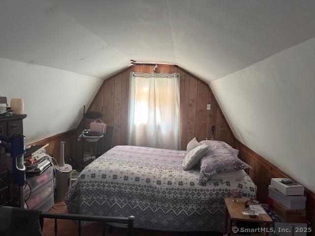 21 Clinic Rd, Pomfret, CT 06230 - bedroom featuring wooden walls and vaulted ceiling