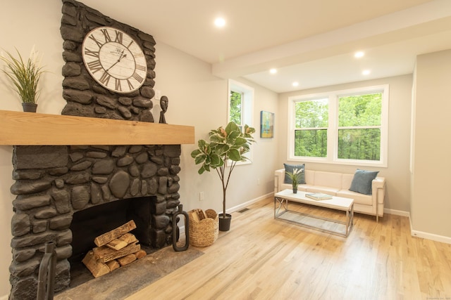 708 County Rd, Guilford, CT 06437 - living area featuring wood finished floors, baseboards, a fireplace, and recessed lighting
