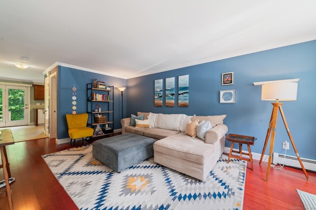 148 Fairway Dr Unit 148, Cheshire, CT 06410 - living area featuring a baseboard heating unit, crown molding, wood finished floors, and baseboards