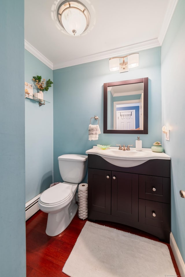 148 Fairway Dr Unit 148, Cheshire, CT 06410 - half bathroom with ornamental molding, vanity, wood finished floors, toilet, and a baseboard radiator