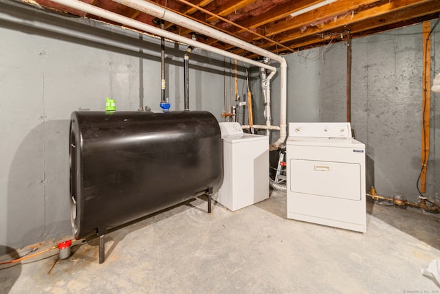 148 Fairway Dr Unit 148, Cheshire, CT 06410 - unfinished basement featuring oil tank and washer and clothes dryer