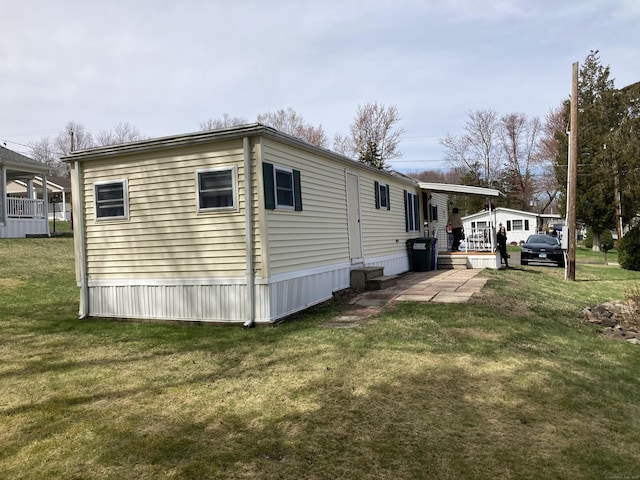 7 Cedar Grove Rd, Southington, CT 06489 - view of side of property with a lawn