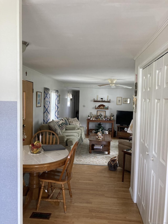 7 Cedar Grove Rd, Southington, CT 06489 - living room with a ceiling fan, wood finished floors, and crown molding