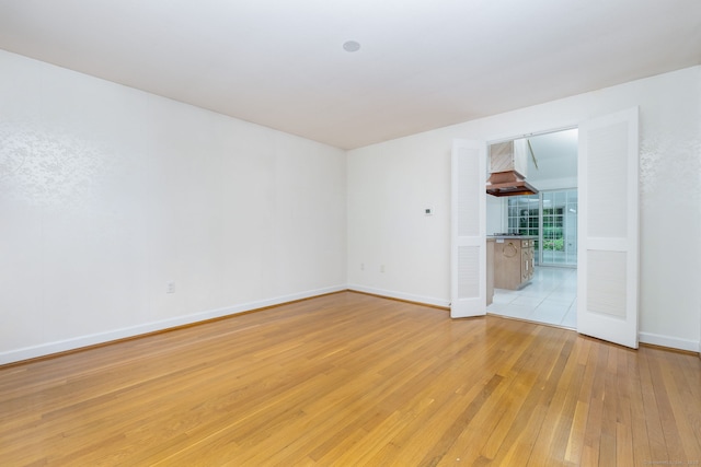 39 Chestnut Hill Rd, Simsbury, CT 06092 - empty room with light wood-style flooring and baseboards