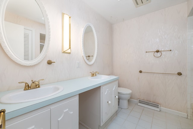 39 Chestnut Hill Rd, Simsbury, CT 06092 - full bathroom featuring double vanity, toilet, and tile patterned flooring