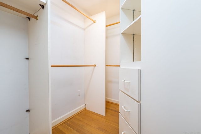 39 Chestnut Hill Rd, Simsbury, CT 06092 - spacious closet with light wood-type flooring