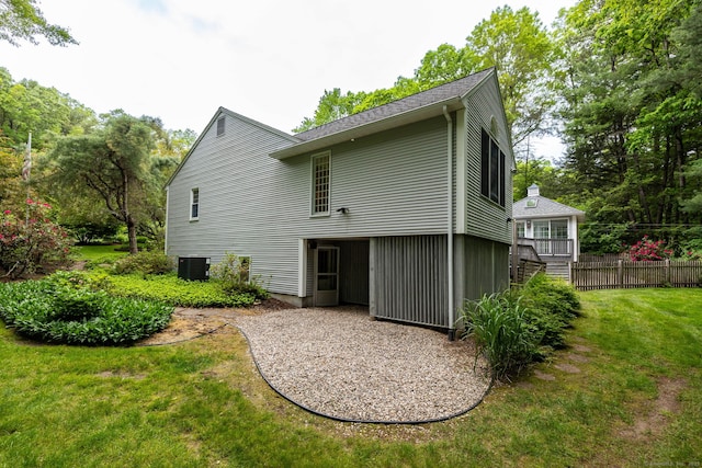 39 Chestnut Hill Rd, Simsbury, CT 06092 - rear view of property featuring cooling unit and a patio area