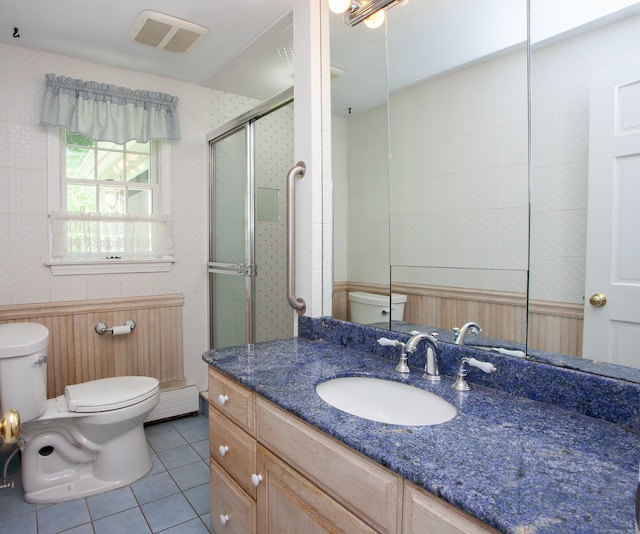 106 Hedgehog Ln, Simsbury, CT 06092 - bathroom featuring toilet, vanity, tile patterned floors, and a shower stall
