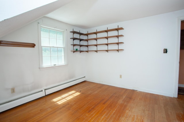 106 Hedgehog Ln, Simsbury, CT 06092 - spare room featuring a baseboard radiator, light wood-type flooring, and baseboards