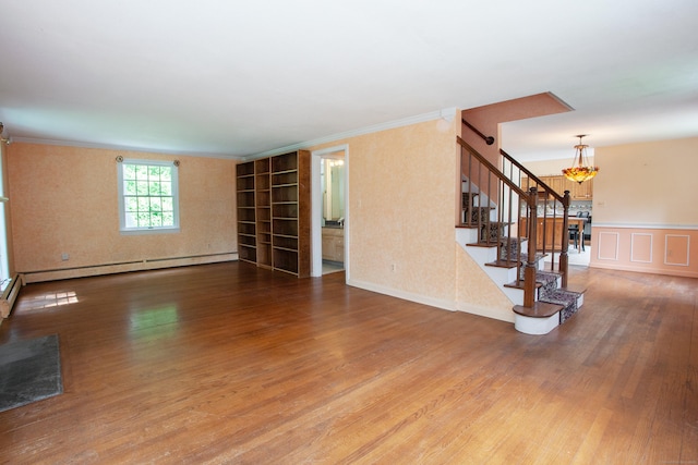 106 Hedgehog Ln, Simsbury, CT 06092 - unfurnished living room with a chandelier, wood finished floors, stairs, ornamental molding, and baseboard heating