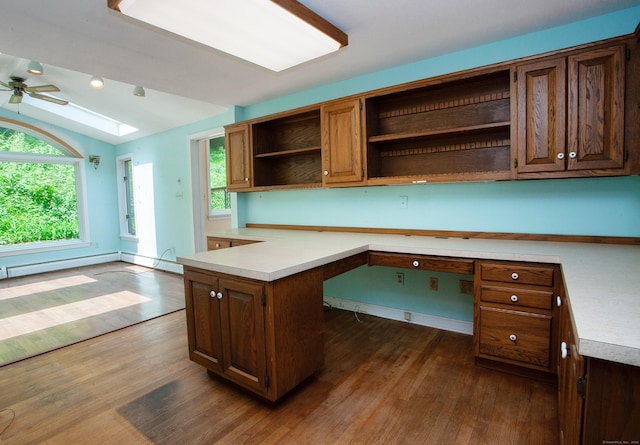 106 Hedgehog Ln, Simsbury, CT 06092 - unfurnished office featuring dark wood-style floors, plenty of natural light, a ceiling fan, a skylight, and lofted ceiling