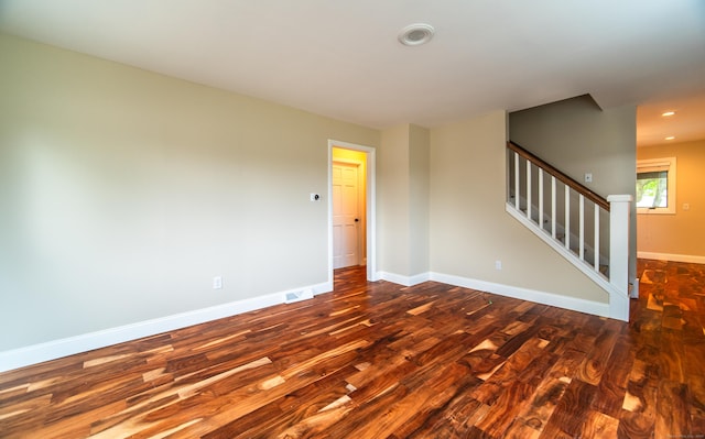 251 Forest Rd, North Branford, CT 06472 - unfurnished room featuring dark wood-type flooring, stairs, baseboards, and recessed lighting