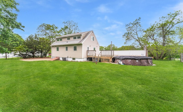 251 Forest Rd, North Branford, CT 06472 - back of house with a deck and a yard