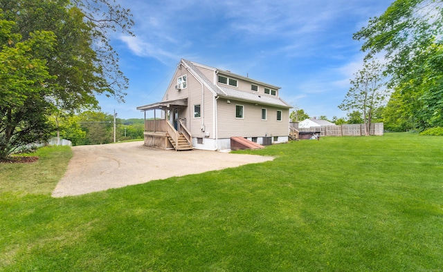251 Forest Rd, North Branford, CT 06472 - back of property featuring central AC unit