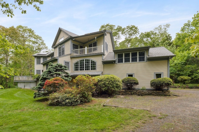 143 Petticoat Ln, East Haddam, CT 06423 - back of house featuring a balcony and a lawn