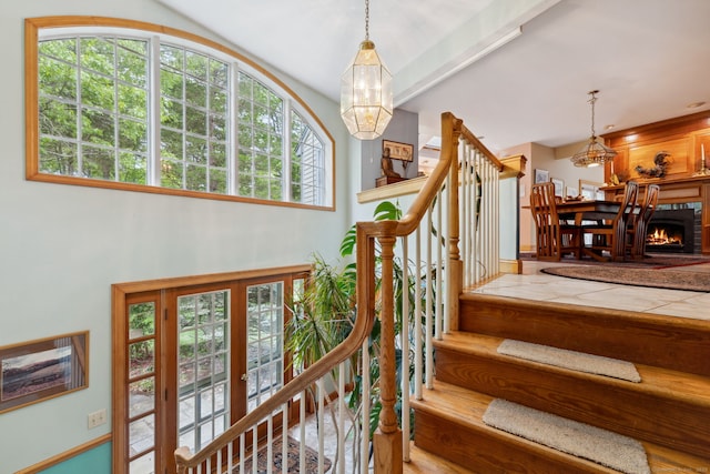 143 Petticoat Ln, East Haddam, CT 06423 - stairway with a chandelier